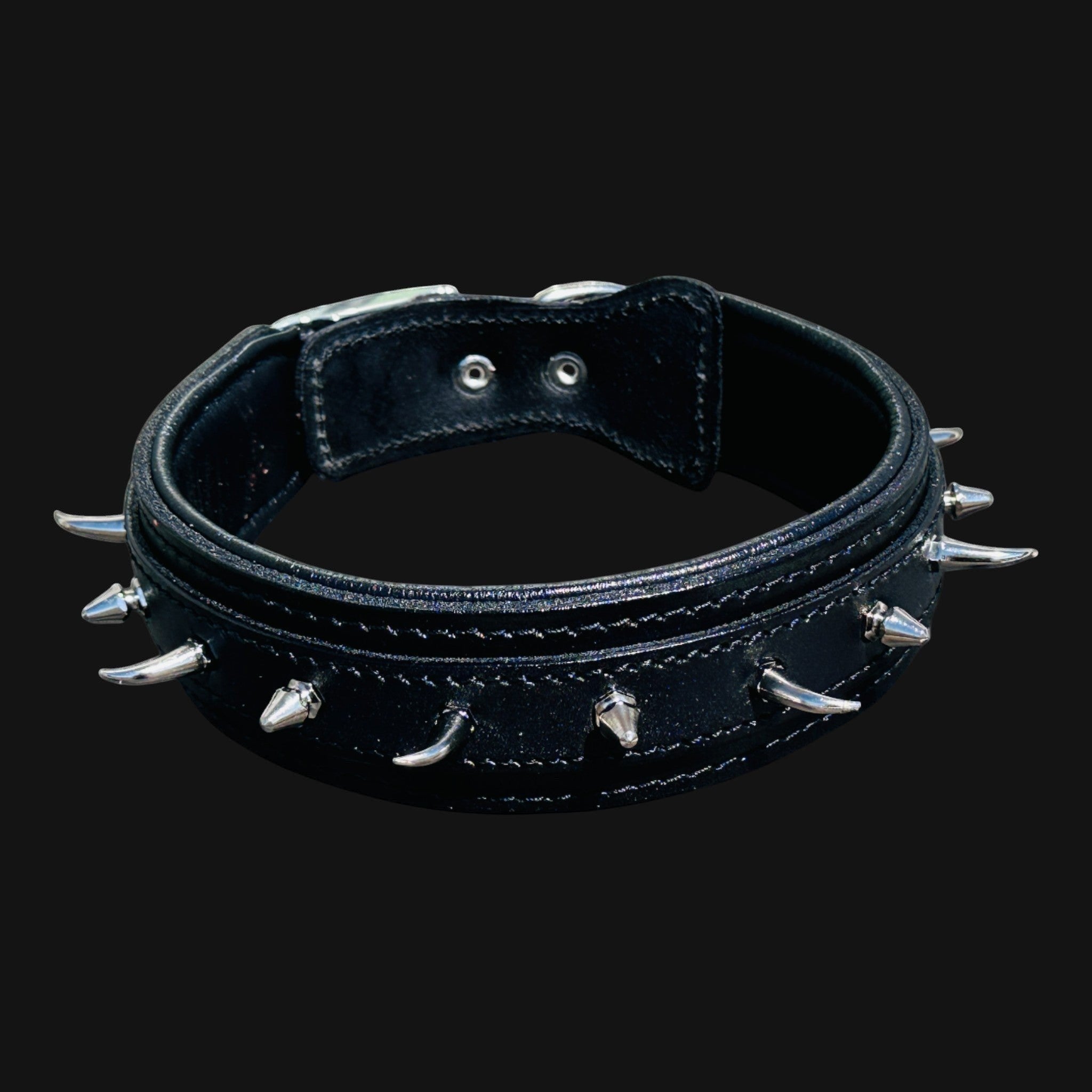 A&C Dog Collars handmade black leather dog collar with silver ivory-style spikes and metal buckle for large breeds.