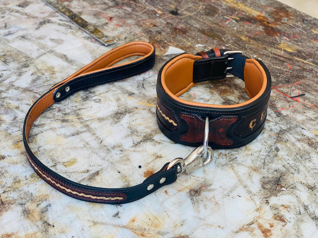Handmade leather dog collar with custom engraved name plate and metal buckle, designed for durable and stylish pet wear.