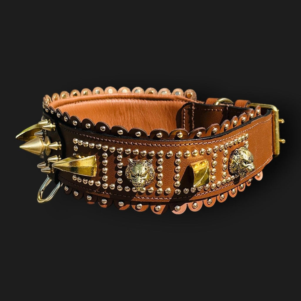 Handmade tan leather dog collar with lion emblem, wide design, crafted by A&C Dog Collars for a stylish and durable pet accessory.