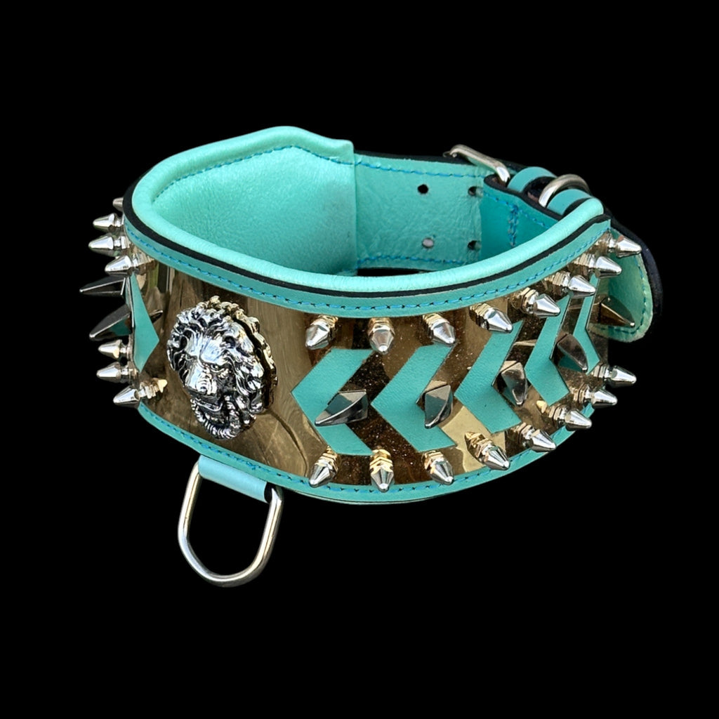 Close-up of lion logo on gold plate – handcrafted premium dog collar.